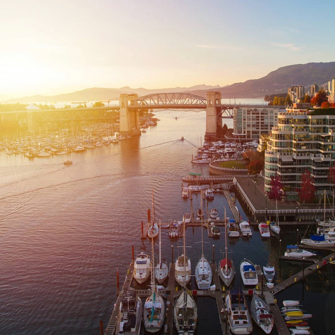 Sunset over Burrard Street Bridge in Vancouver. Connecting Granville Island and Kits Point with Yaletown
