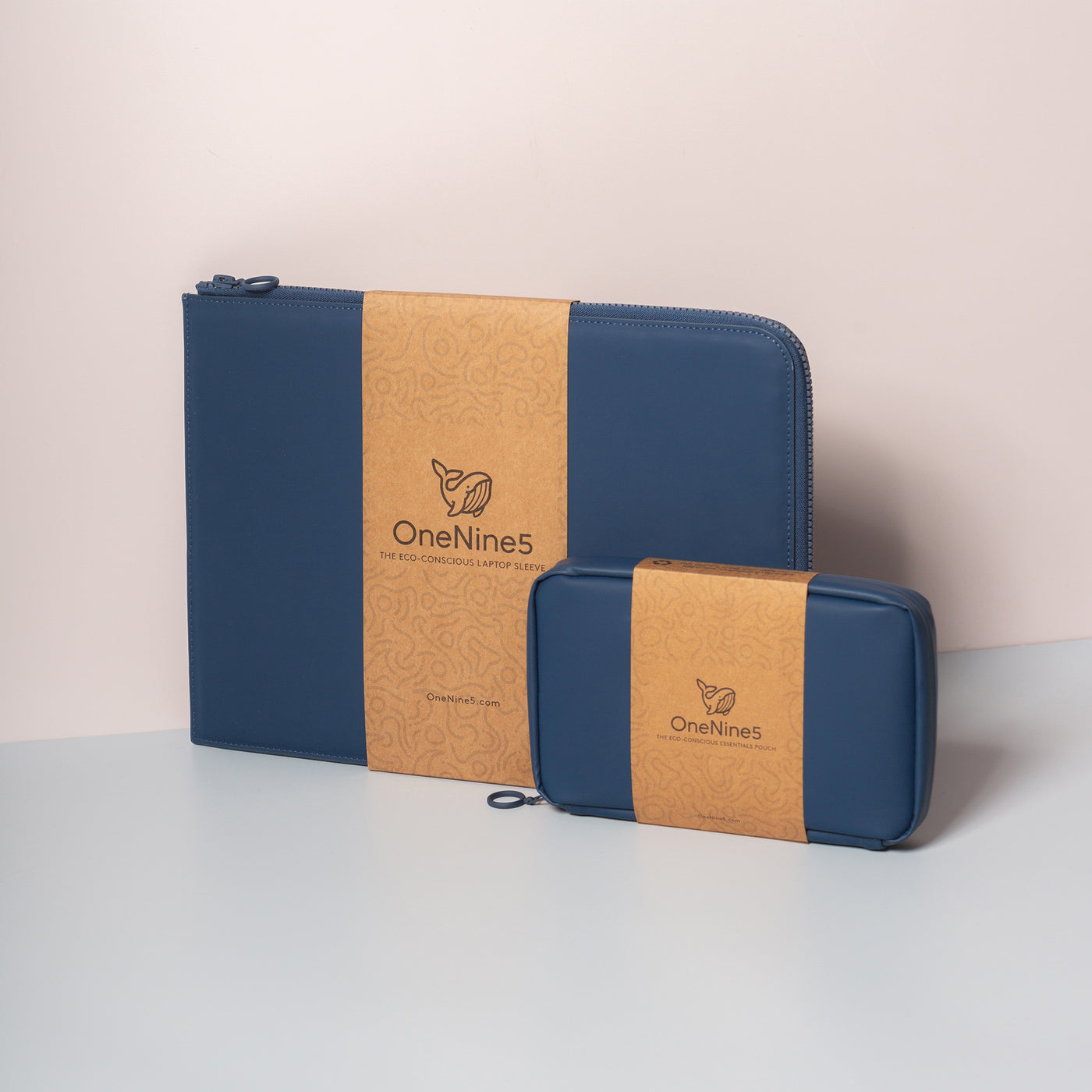 OneNine5 blue coconut padded 13" Eco-Conscious Laptop Sleeve and vegan leather Eco Essentials Pouch. Packaged in a brown and recyclable kraft paper sleeve